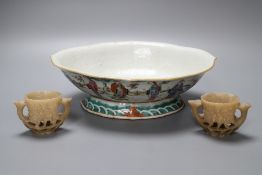 A Chinese dish, length 26cm and two soapstone potsCONDITION: The dish has a chip to rim. Soapstone