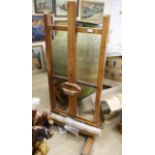 A wooden adjustable artist's studio easel, from the studio of George Bissill (1896-1973), Four