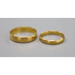 2 x 22ct gold wedding bands, gross 6.3 grams.