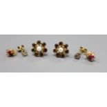 A pair of 9ct and diamond stud earrings (stones approx. 0.05ct each), and two other pairs of stud