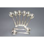 A set of eight George V silver Kings pattern soup spoons, Walker & Hall, Sheffield, 1933, 23.25oz.