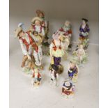 A Derby tailor's wife group and twelve Continental or Staffs porcelain figures, tallest 20cm