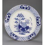 An 18th century Bow blue and white charger, diameter 32cmCONDITION: Two repaired chips at lower rim,