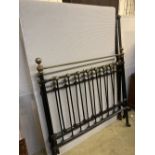 A Victorian style brass and iron double bed frame, width 4ft. 6in., height 140cm