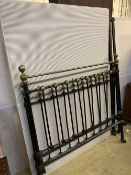 A Victorian style brass and iron double bed frame, width 4ft. 6in., height 140cm