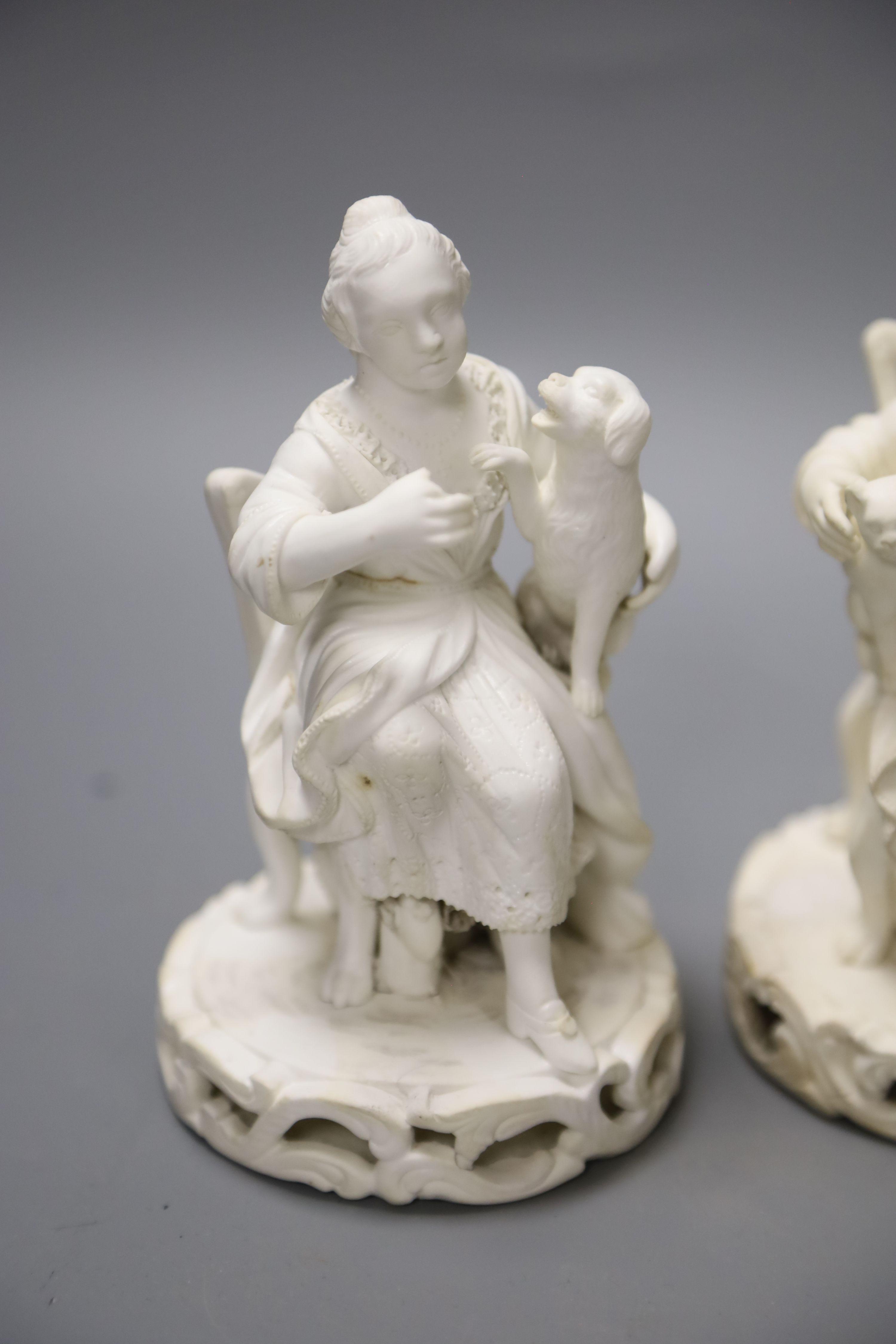 An early 19th century pair of Derby biscuit figures of a boy with a cat and a girl with a dog and - Image 2 of 6