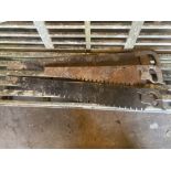 Three vintage hand saws, largest 120cm