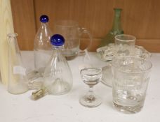 A small quantity of 19th century glass, including three late Georgian bird feeders and an eye bath