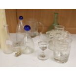 A small quantity of 19th century glass, including three late Georgian bird feeders and an eye bath