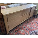 A modern contemporary oak sideboard, length 220cm, depth 45cm, height 85cm