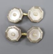 A pair of 1940's 14c, plat and mother of pearl octagonal cufflinks, gross 8 grams.CONDITION: Both