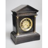 Kemp & Wilcox of Wolverhampton. A Victorian black slate mantel clock, height 31cm