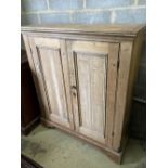 A Victorian pine two door cabinet, width 109cm, depth 37cm, height 127cm