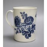 An 18th century Worcester mug decorated with large floral sprays, height 14cmCONDITION: Structurally