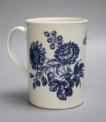 An 18th century Worcester mug decorated with large floral sprays, height 14cmCONDITION: Structurally