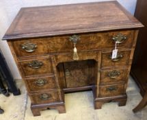 A George I style walnut kneehole desk, width 82cm, depth 49cm, height 78cm