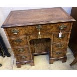 A George I style walnut kneehole desk, width 82cm, depth 49cm, height 78cm