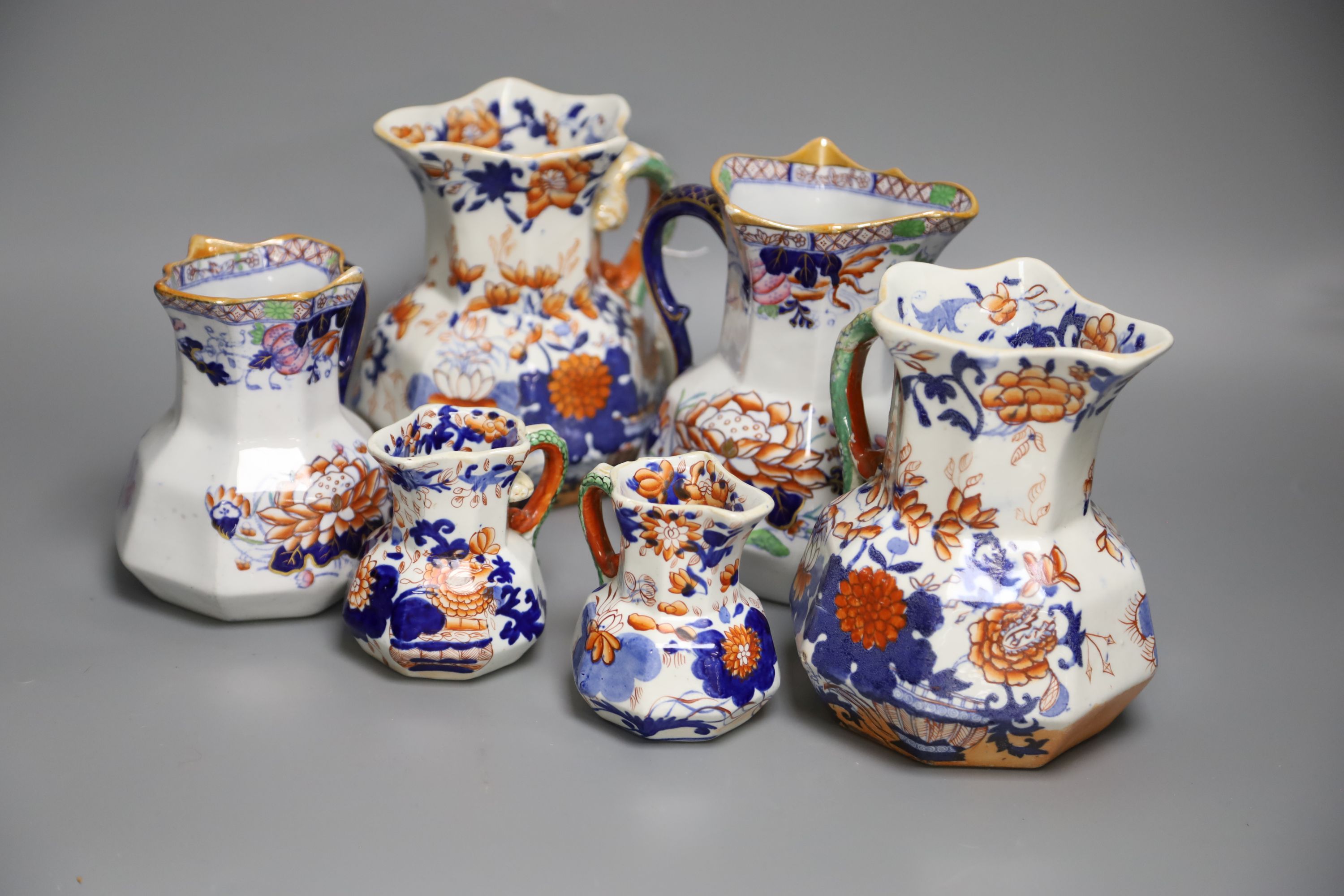 Six various 19th century Ironstone jugsCONDITION: One of the tallest of these jugs glue repaired
