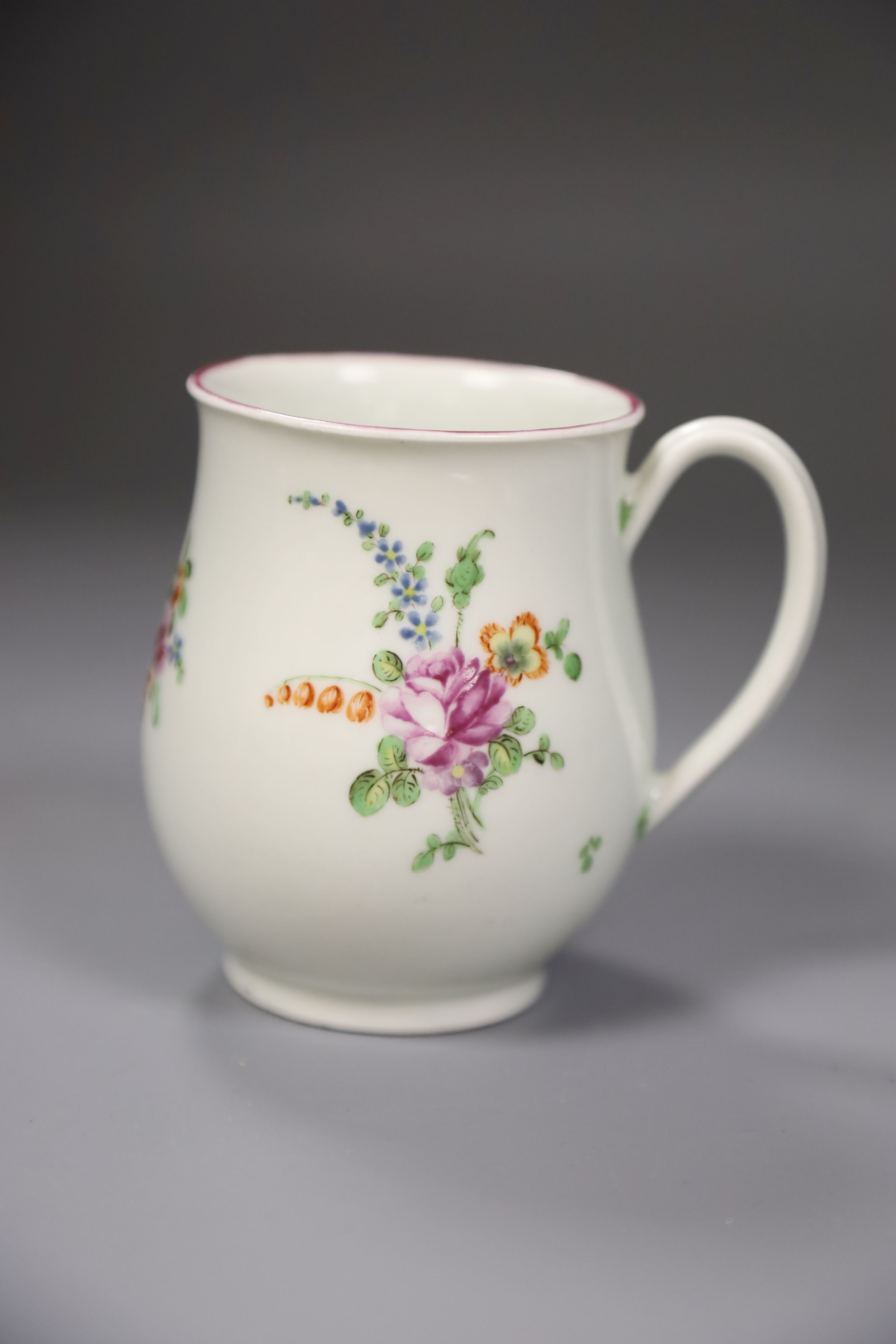 A Worcester bell shape mug painted with scattered coloured flowers, height 9cm - Image 2 of 4