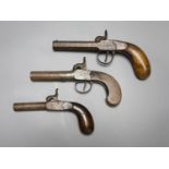 A Wilson of London box lock percussion cap pistol and two others