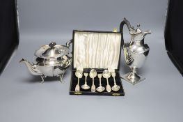 Am Edwardian silver teapot, Sheffield, 1905, an Edwardian silver hot water pot and six cased