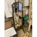 A 1920's walnut cheval mirror, width 54cm, height 164cmCONDITION: Some silvering to the mirror. No