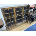 A Queen Anne revival burr walnut three door glazed bookcase, width 132cm, depth 33cm, height 118cm