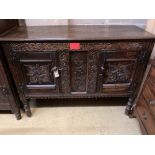 A 17th century and later oak two door cabinet, width 126cm, depth 46cm, height 94cm