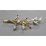 A 1960's 18ct gold, sapphire and diamond set foliate spray brooch, 54mm, gross 6.7 grams.