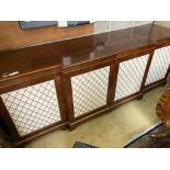 A Regency style mahogany breakfront cabinet, width 240cm, depth 64cm, height 91cm