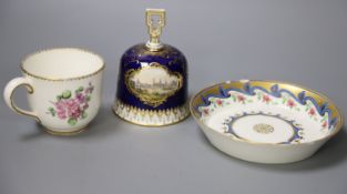 A Meissen hand-painted table bell, a Vienna saucer, diameter 13.5cm, and a Sevres cupCONDITION:
