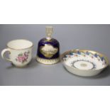 A Meissen hand-painted table bell, a Vienna saucer, diameter 13.5cm, and a Sevres cupCONDITION: