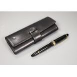 A Montblanc fountain pen with leather case, nib no. 4180, 14k including five original ink