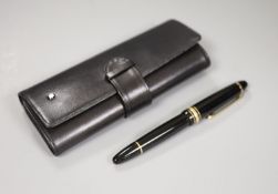 A Montblanc fountain pen with leather case, nib no. 4180, 14k including five original ink