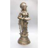 An Indian bronze figure of Deepalakshmi, (representation of the Hindu Goddess Lakshmi, symbol of