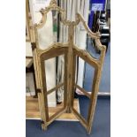 An early 20th century giltwood and gesso part glazed three fold dressing screen, height 172cm