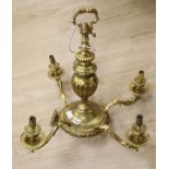 A Louis XIV style five branch solid brass chandelier, drop 65cm