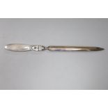 A George Jensen sterling handled paper knife, 21cm.CONDITION: A few very minor scratches to the