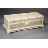 An antique Indian carved ivory casket, length 29cm (no key)