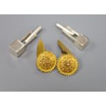 A pair of yellow metal cannetile work cufflinks, gross 6.8 grams and a pair of Peruvian Ilaria 950