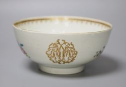 An 18th century Worcester bowl painted with coloured flowers gilded and outlined in red with