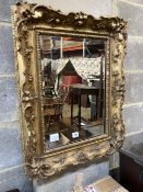 A Victorian rectangular giltwood and gesso frame (now as a wall mirror) width 53cm, height 69cm