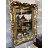 A Victorian rectangular giltwood and gesso frame (now as a wall mirror) width 53cm, height 69cm