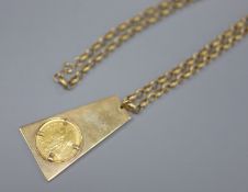 A 9ct gold ingot inset an 1894 sovereign, on 9K gold chain, gross 33g.