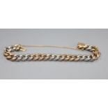 A yellow and white metal curblink bracelet (a.f.), gross 32.9 grams.
