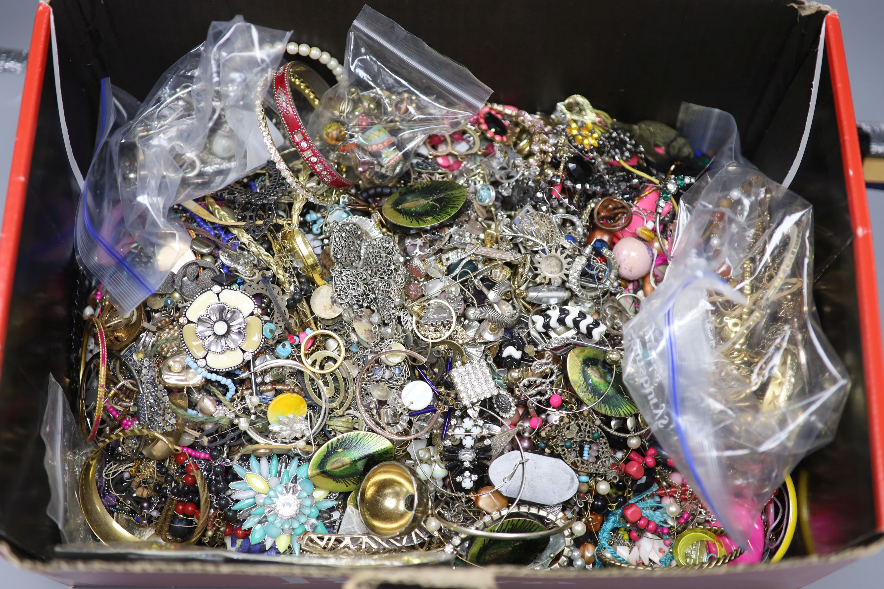 A large quantity of assorted costume jewellery.