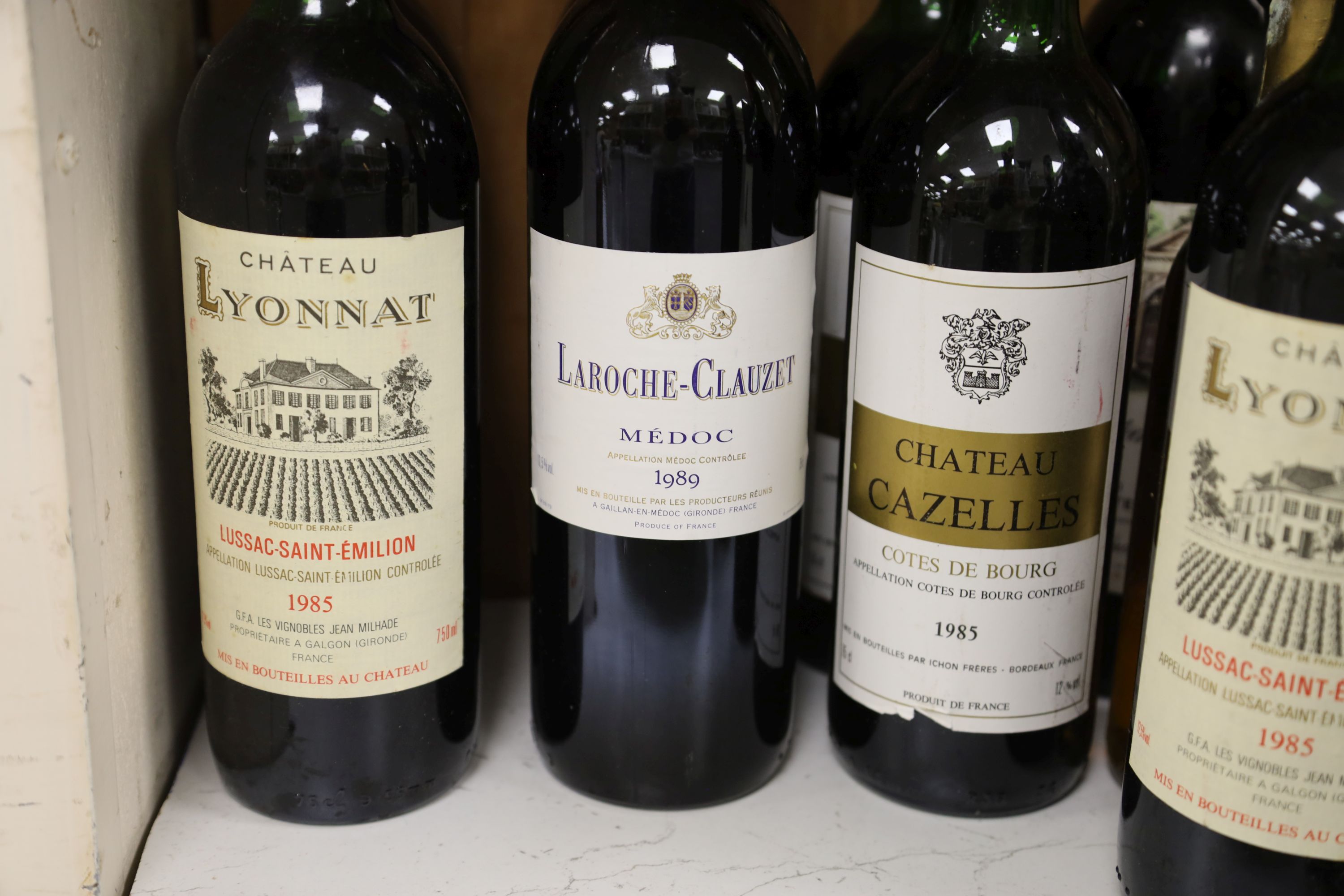 Three bottles of Chateau Lyonnat, 1985, two bottles of Laroche-Clauzet, 1989, two Chateay - Image 2 of 3