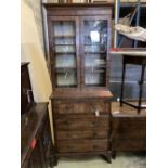 A George III Sheraton style secretaire bookcase, width 79cm, depth 49cm, height 210cm