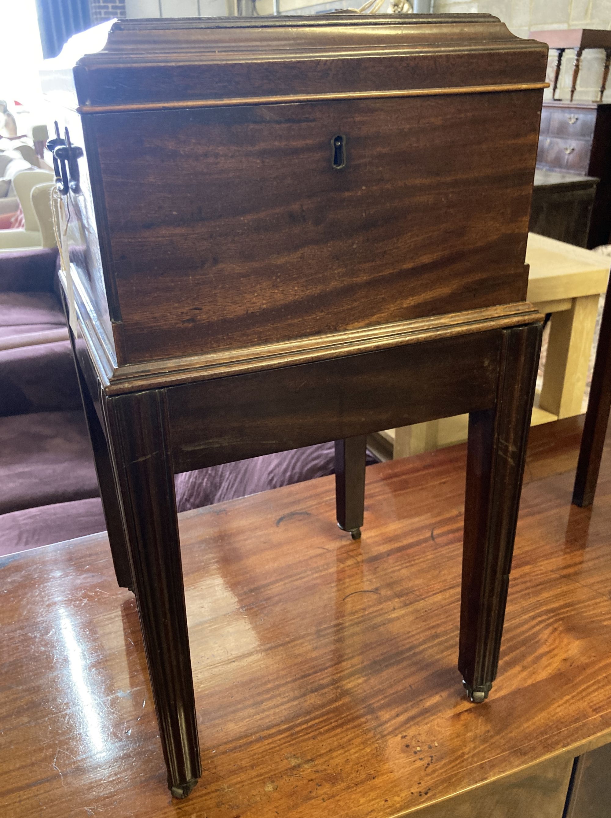 A Chippendale style inlaid mahogany decanter box on stand, width 37cm, depth 36cm, height 67cm