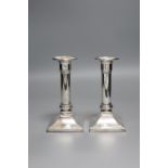 A pair of modern 925 sterling dwarf candlesticks, height 14.5cm, weighted.